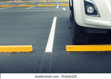 Car Parking Lot And Asphalt Slab Pavement, City Vehicle Outdoors Park With Allocate Area Strip Line Painting. Public Parking On Concrete Asphaltic Paving And Front View Of Personal Car