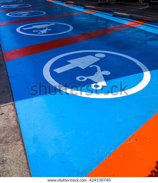 Car parking space reserved for mothers with
children - Parking lot street
sign
