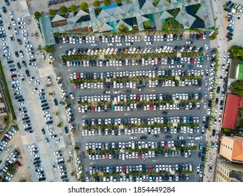 Car Parking Lot View From Above, Aerial View At Ninja Night Market Chonburi. Top View Parking In Thailand.