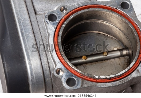 Car part engine throttle valve opened by the\
gas pedal to supply more air to the engine. Spare parts catalog for\
vehicles from the junkyard.