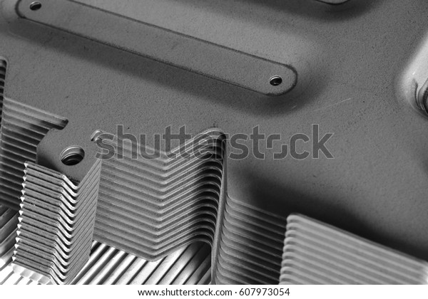 Car parts Produced by Accurate
Sheet Metal Stamping Tool Die. Black-and-white
photo.