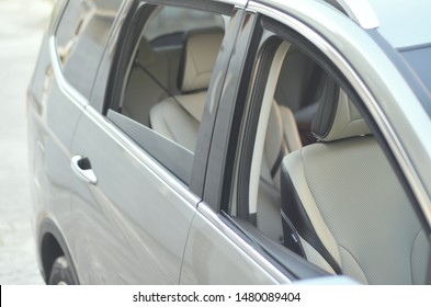 Car Passenger And Driver Window Open