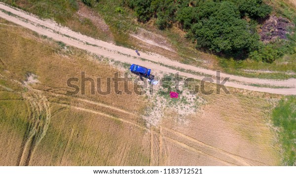 Car at picnic aerial\
shot