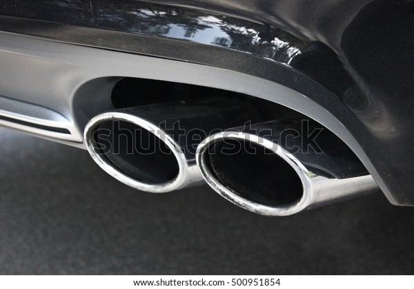 \
Car pipe.\
Exhaust.Double exhaust pipes of a\
car