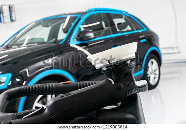 Car polish wax concept. Buffing and polishing car.\
Car detailing. Polish paste and tube. Polishing car service. Polish\
tools.