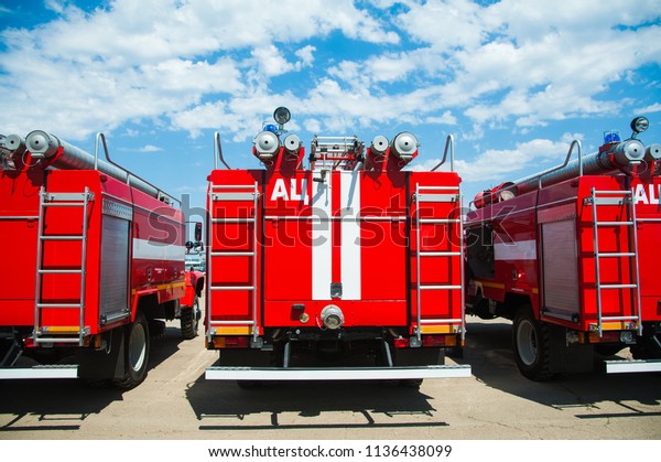 Car pool with\
fire engines of fire\
department