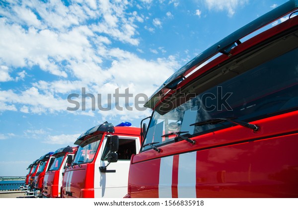Car pool with\
fire engines of fire\
department
