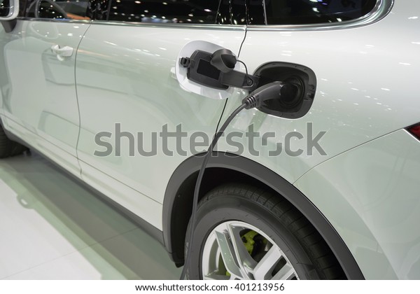Car Power Plug in to\
electric car.
