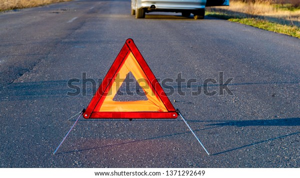 Car problems, red warning triangle! Car fixing  .\
the tool for car repairs