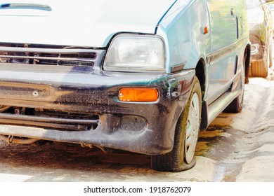  Car With A Puncture And Flat Tire Parked On The Roadside.