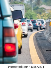 Car Queue In The Bad Traffic Road. Selective Focus.