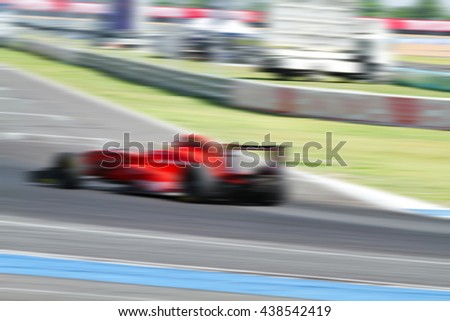  car racing on the road and track with motion blur and Radial blur 