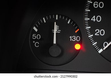 Car Radiator Water Temperature Gauge Scale With Orange Reserve Light On. Close Up Macro Shot, No People.