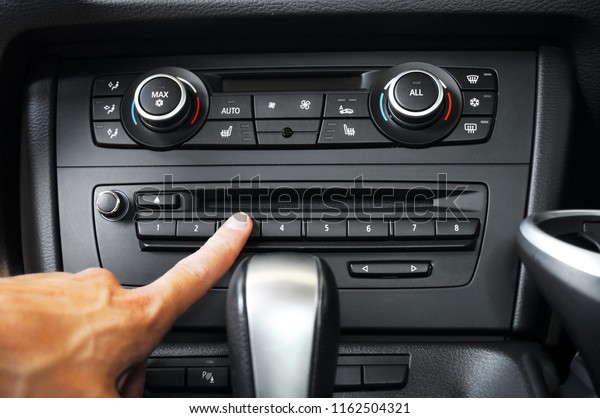 Car radio\
buttons and air condition buttons\
