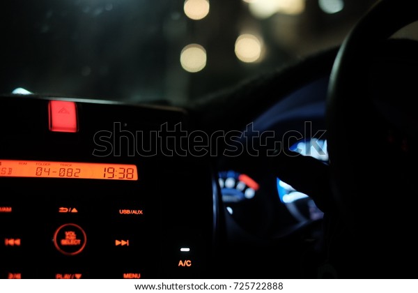 Car radio close up at night
