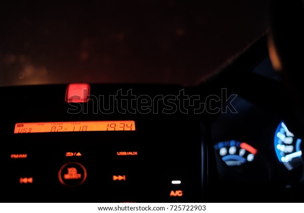 Car radio close up at night
