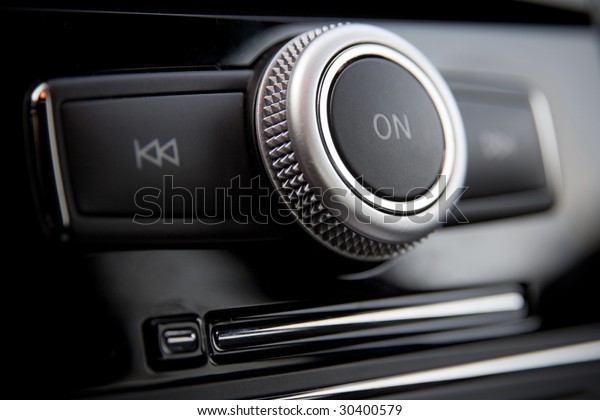 Car radio control buttons\
closeup