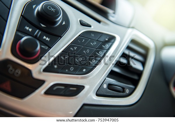 Car radio and phone system,Button on dashboard in\
car panel