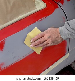 Car Ready For Repaint, Worker Sanding Primer