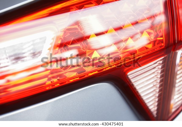 Car Rear light\
bulb as abstract background