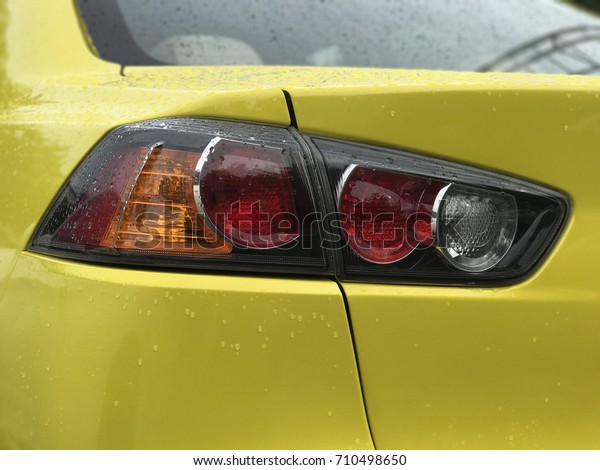 car rear light design\
and water drops.