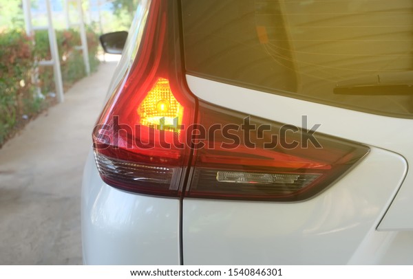 Car rear\
light,Detail on the rear light of a\
car.