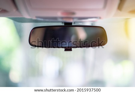 Car rear view mirror inside the car.