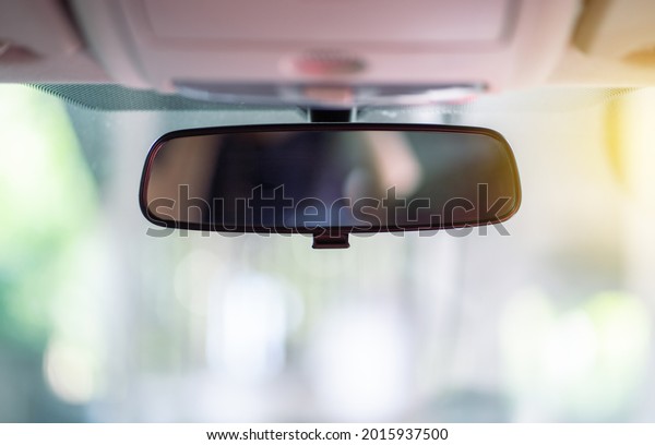 Car rear view mirror\
inside the car.