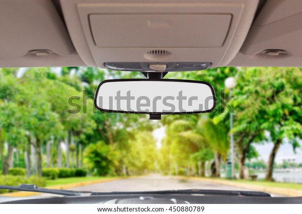 Car rear view mirror\
inside the car.\
