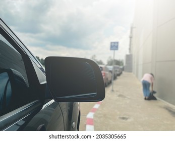 Car And Rear View Mirror On The Road (rearview)