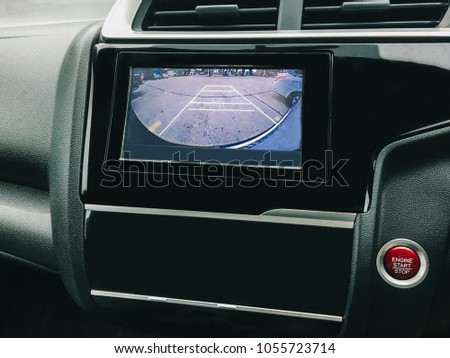 Car rear view system monitor reverse abstract background texture.