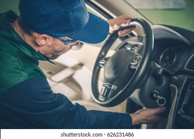 Car Recall Maintenance. Automotive Recall Concept. Technician Preparing Vehicle For The Repair.