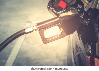 Car Refueling On Petrol Station. Fuel Pump Gasoline Oil. Service Is Filling Gas Or Biodiesel Into The Tank. Automotive Industry Or Transportation Concept