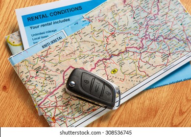 Car Remote Key On Map And Rental Agreement