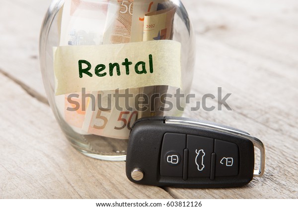 Car rent concept -\
money glass , car key