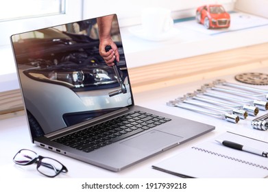 Car Repair Courses. On The Table Are A Computer And Tools For Car Repair. Online Learning