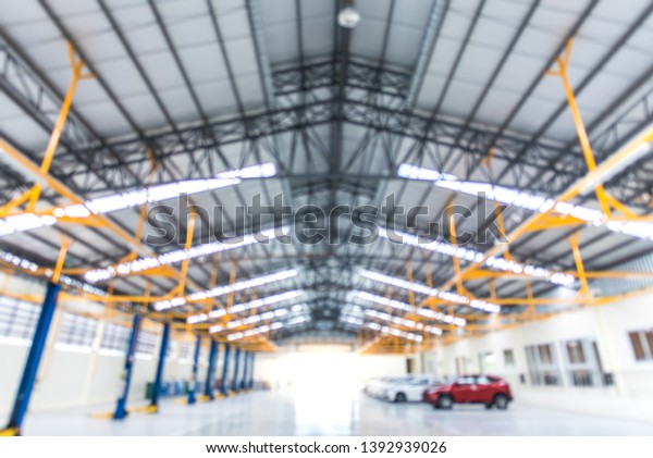 Car\
repair service center, The interior of a big industrial building or\
factory with steel constructions.,Steel roof\
frame