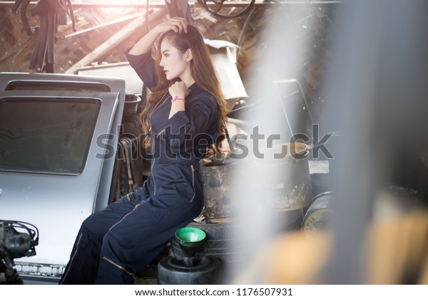 Car repair with sexy
women