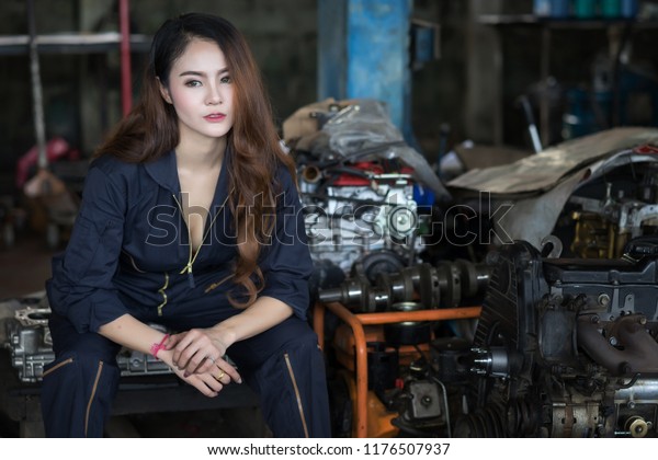 Car repair with sexy
women