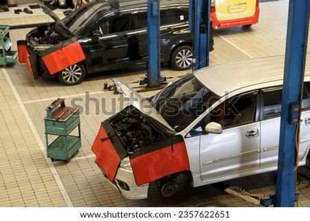 car repair shop. cars queue at the repair shop for repairs, oil changes, regular servicing