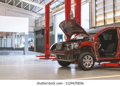 car in repair station and body shop with soft-focus and over light in the background