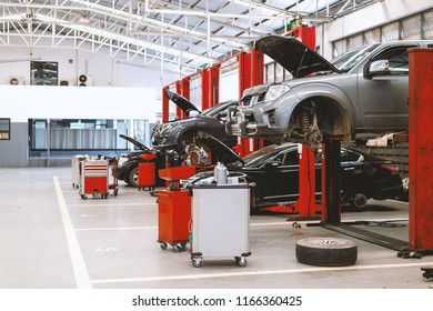 car repair station with soft-focus and over light in the background - Powered by Shutterstock