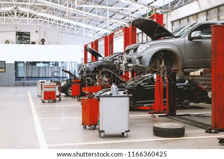 car repair station with soft-focus and over light in the background