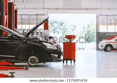 car repair station with soft-focus and over light in the background