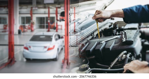 Car Repairman Is Checking Engine Oil Level In Automotive Workshop, Maintenance Car Worker Inspection Checkup Oil Vehicle Engines By Dipstick Test At Automobile Shop Station. Auto Car Services