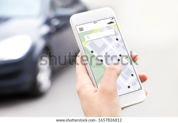 Car or ride share mobile app in smartphone.\
Carsharing, ridesharing or carpool service. Sharing economy\
concept. Person ordering taxi online with phone. Map location in\
screen. Automobile rent\
system.