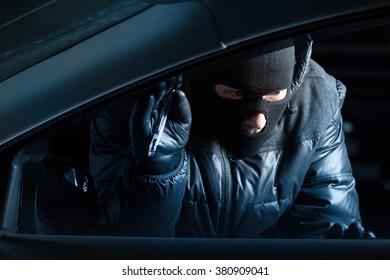 Car Robber At Night