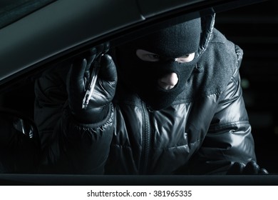 Car Robber At Night