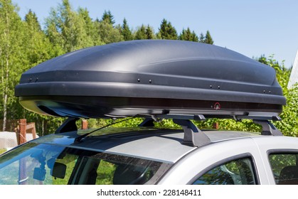 Car With The Roof Rack With Cargo Box