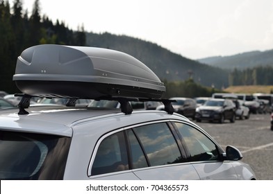 Car With The Roof Rack With Cargo Box